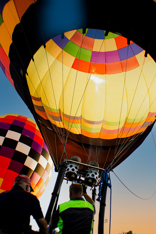 Picture of a couple of Balloons Over Bloomington balloons ready to launch