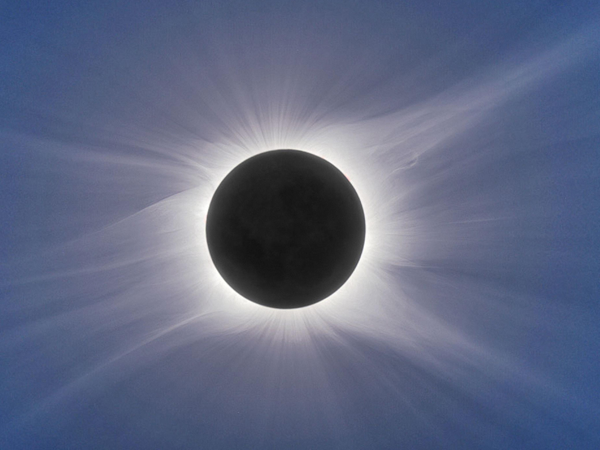 An image of a solar eclipse during totality.